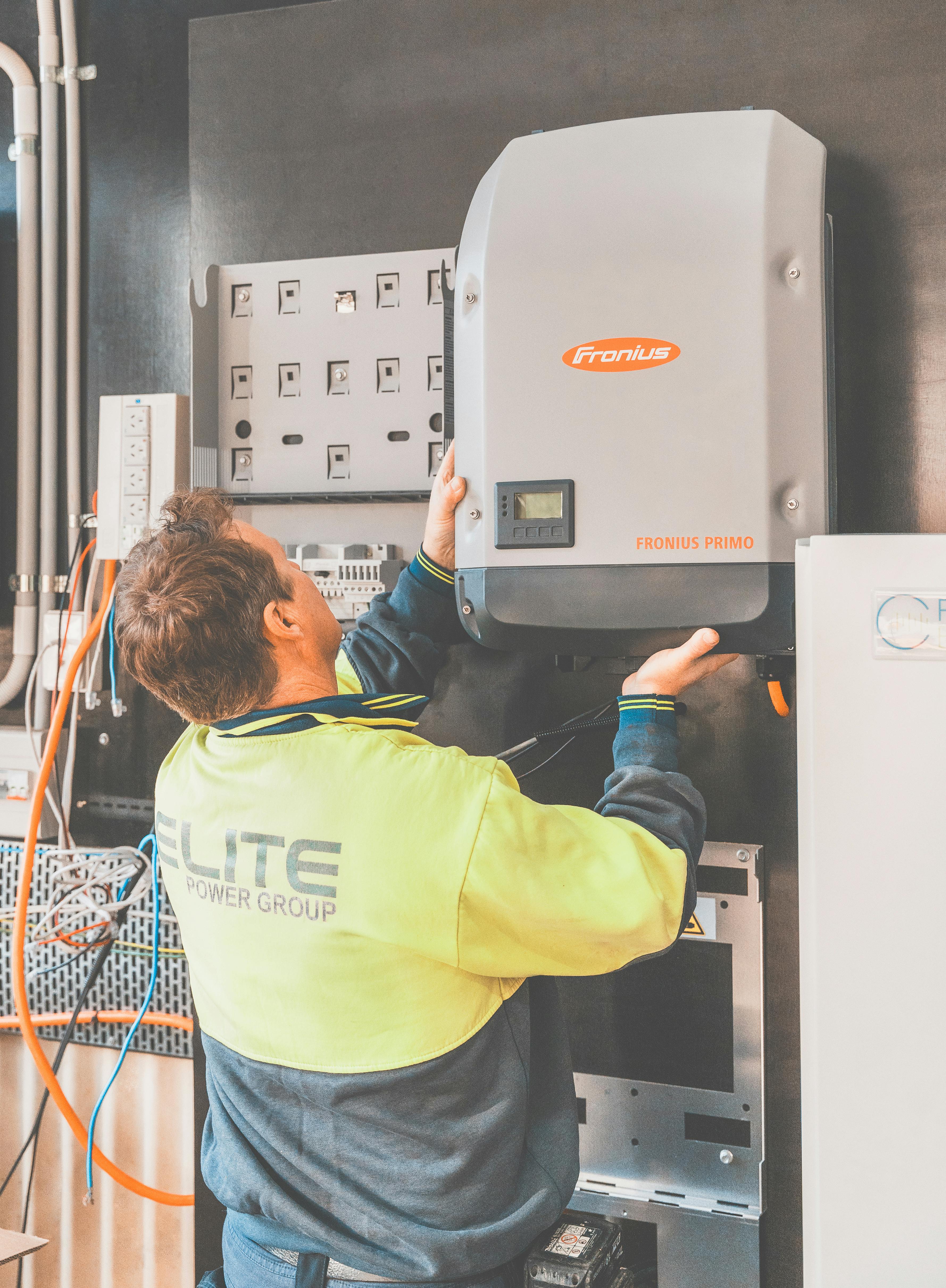 Licensed insulation technician working on electrical systems